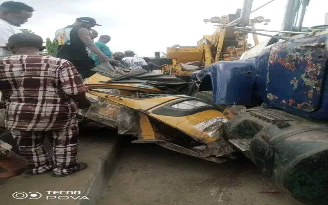 Truck Crushes Keke, Damages Car In Lagos